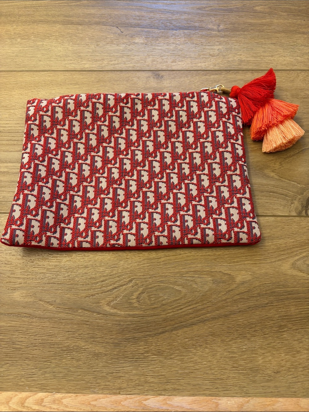 Repurposed designer pouch
